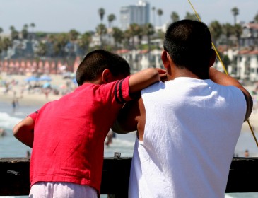 Father and Son Fishing at Oceanside Pier in California