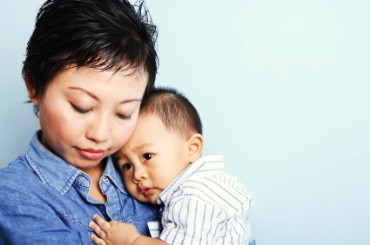 Mother Holding Son