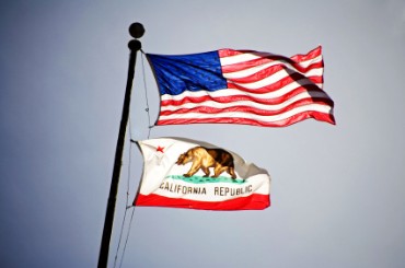 U.S. Flag Flying above California Flag